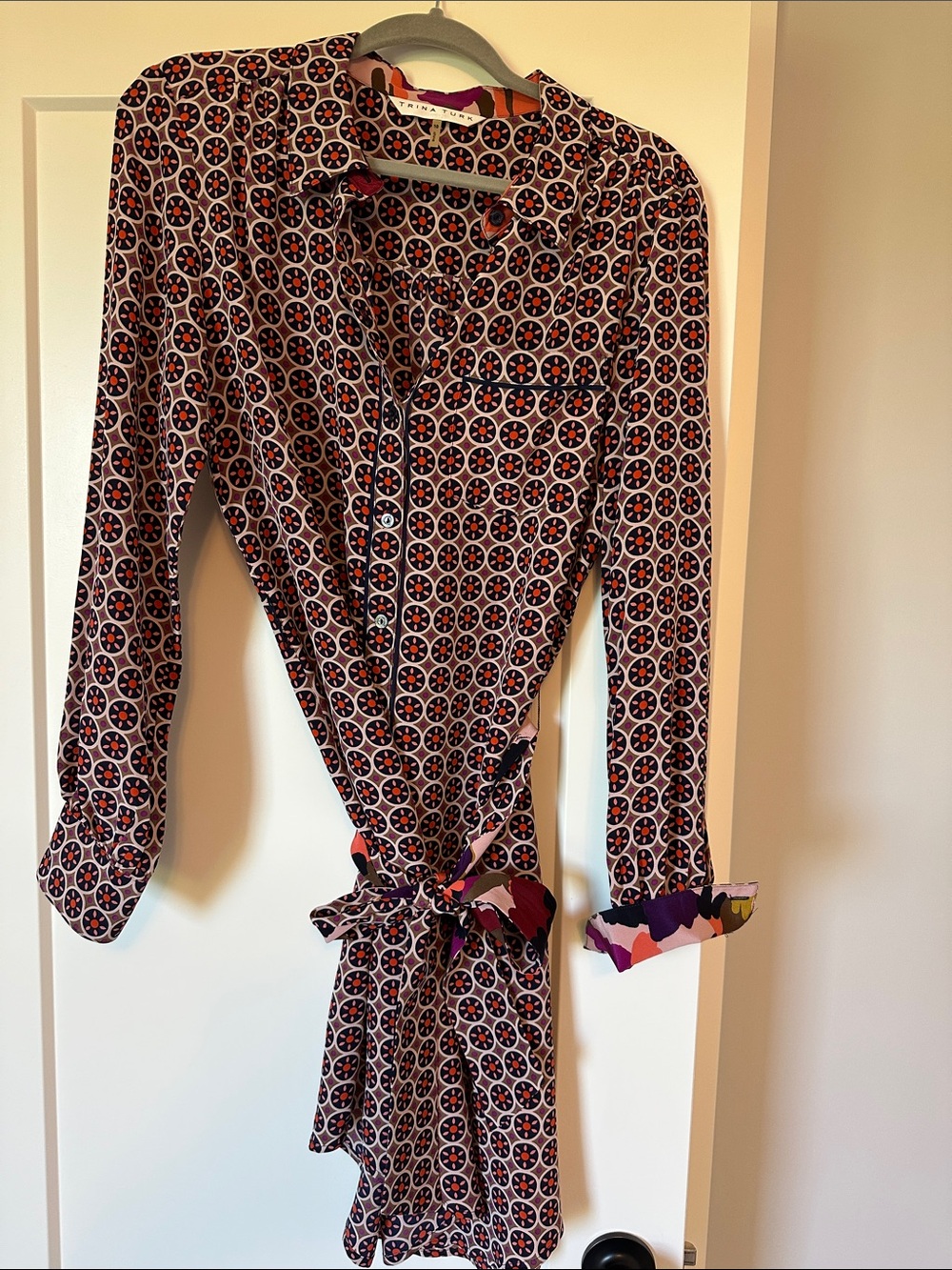Trina Turk long-sleeve geometric print shirt dress with tie belt.